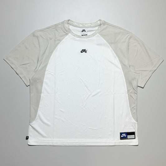 Full front image of white with bone color blocked jersey. Nike SB logo embroidered on chest.