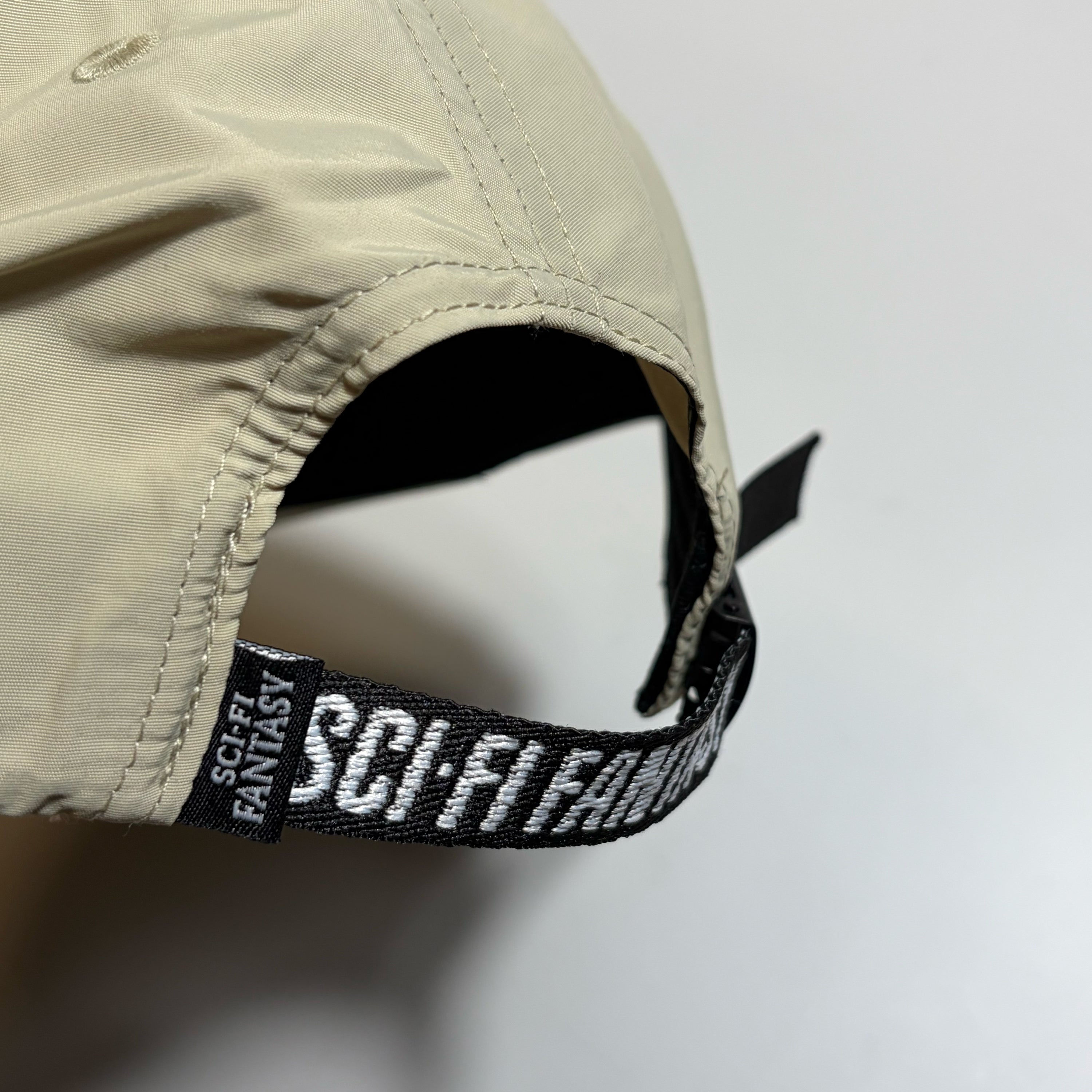 Close detail of custom jacquard nylon closure strap. 