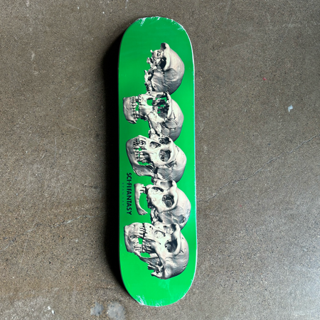 Full image of deck. Green background with evolving skulls in white