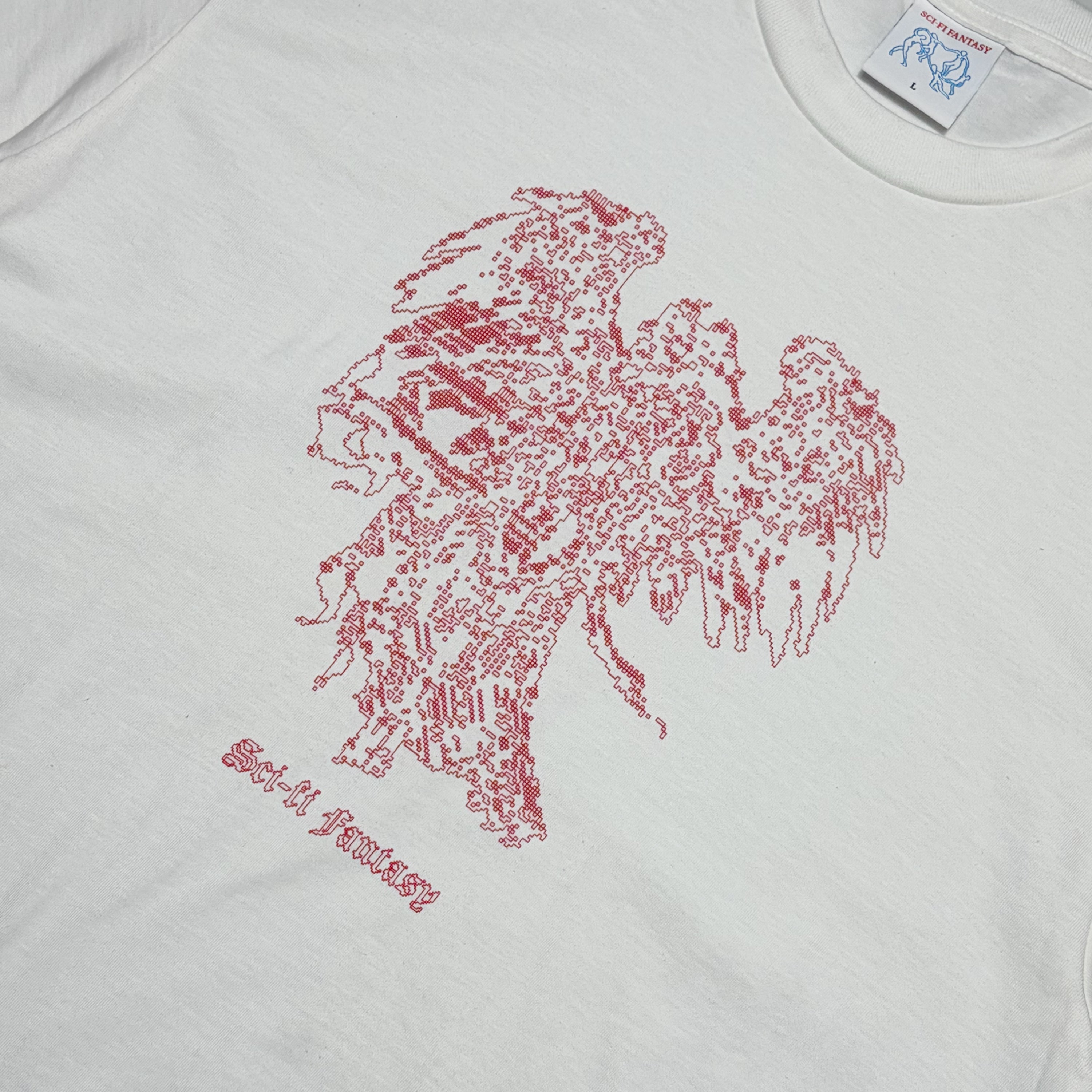 Close detail of red printed angel on chest.