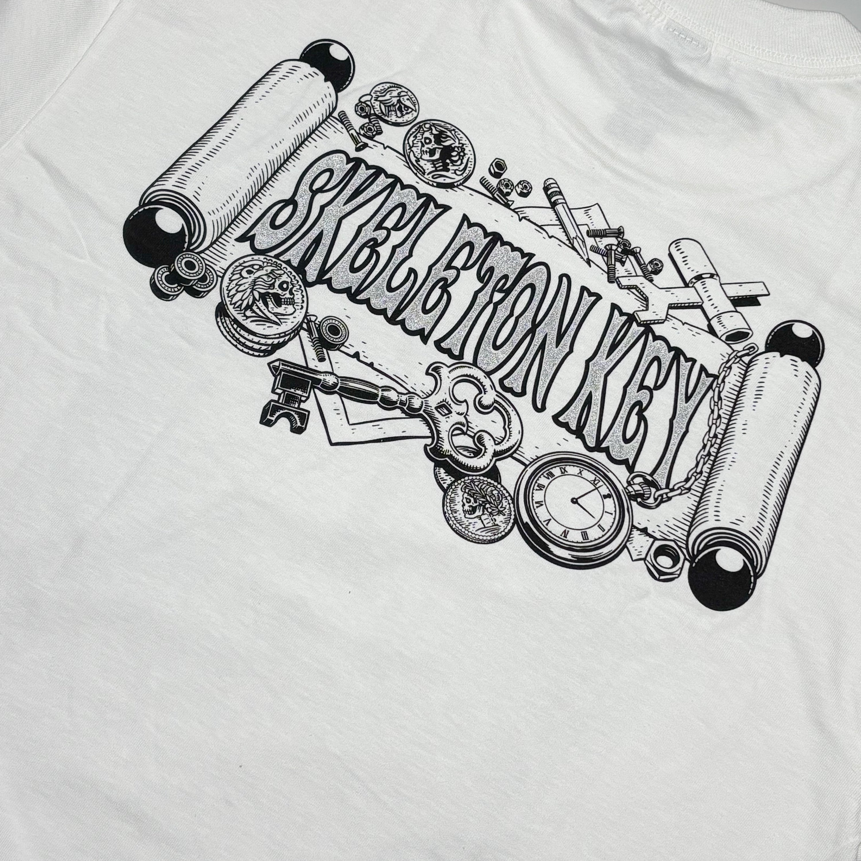 Close detail of black printed art on back.