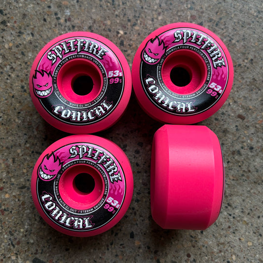 Set of 4 Spitfire pink conical formula four wheels. 