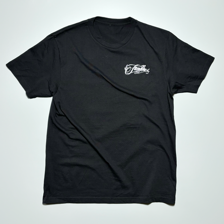 Front image of black tee. White logo printed on left chest.