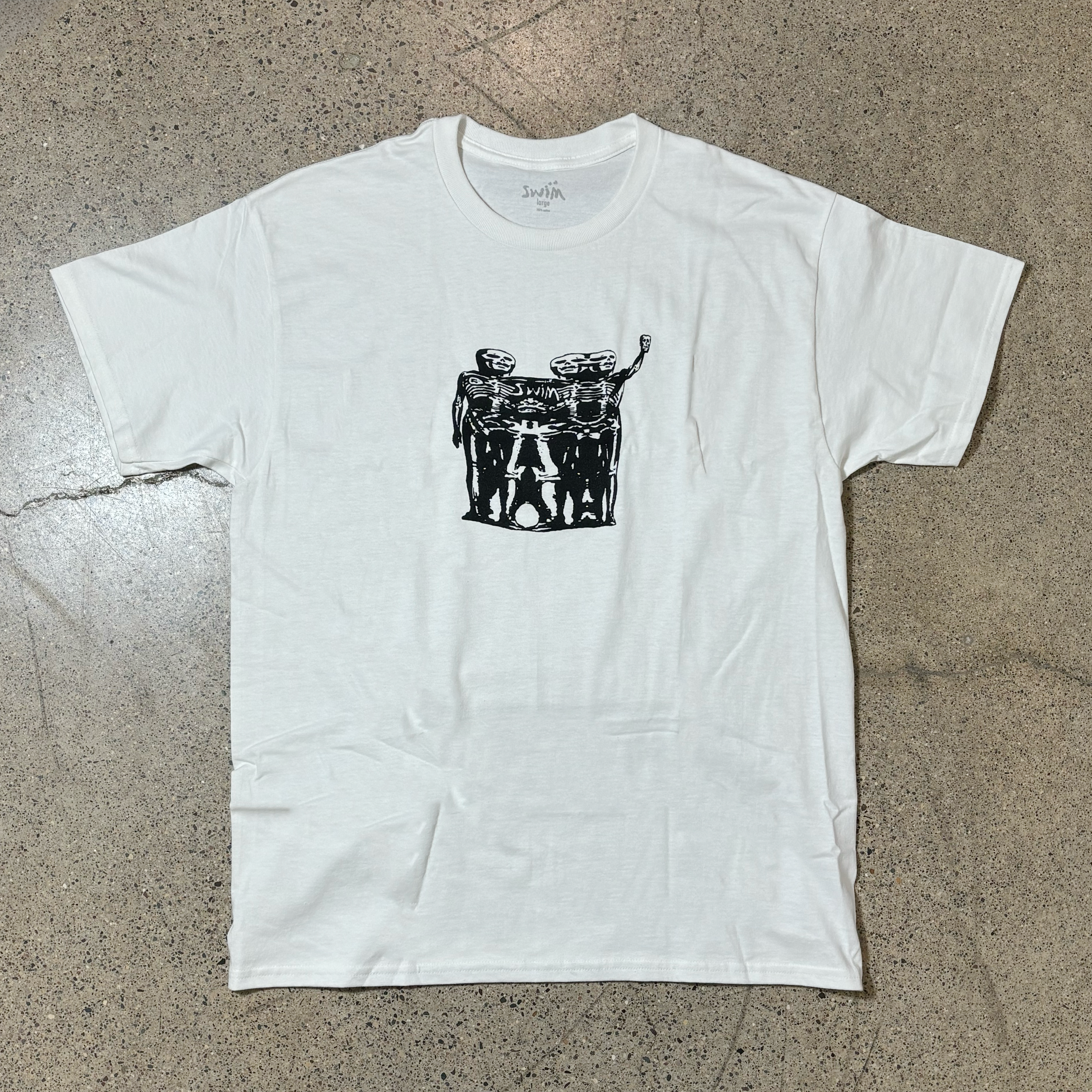 FRONT IMAGE OF SKELETONS BEING STRETCH SIDEWAYS. BLACK INK ON WHITE TEE