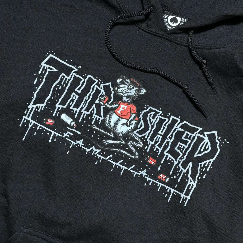 Close detail of Thrasher skate rat art on chest.