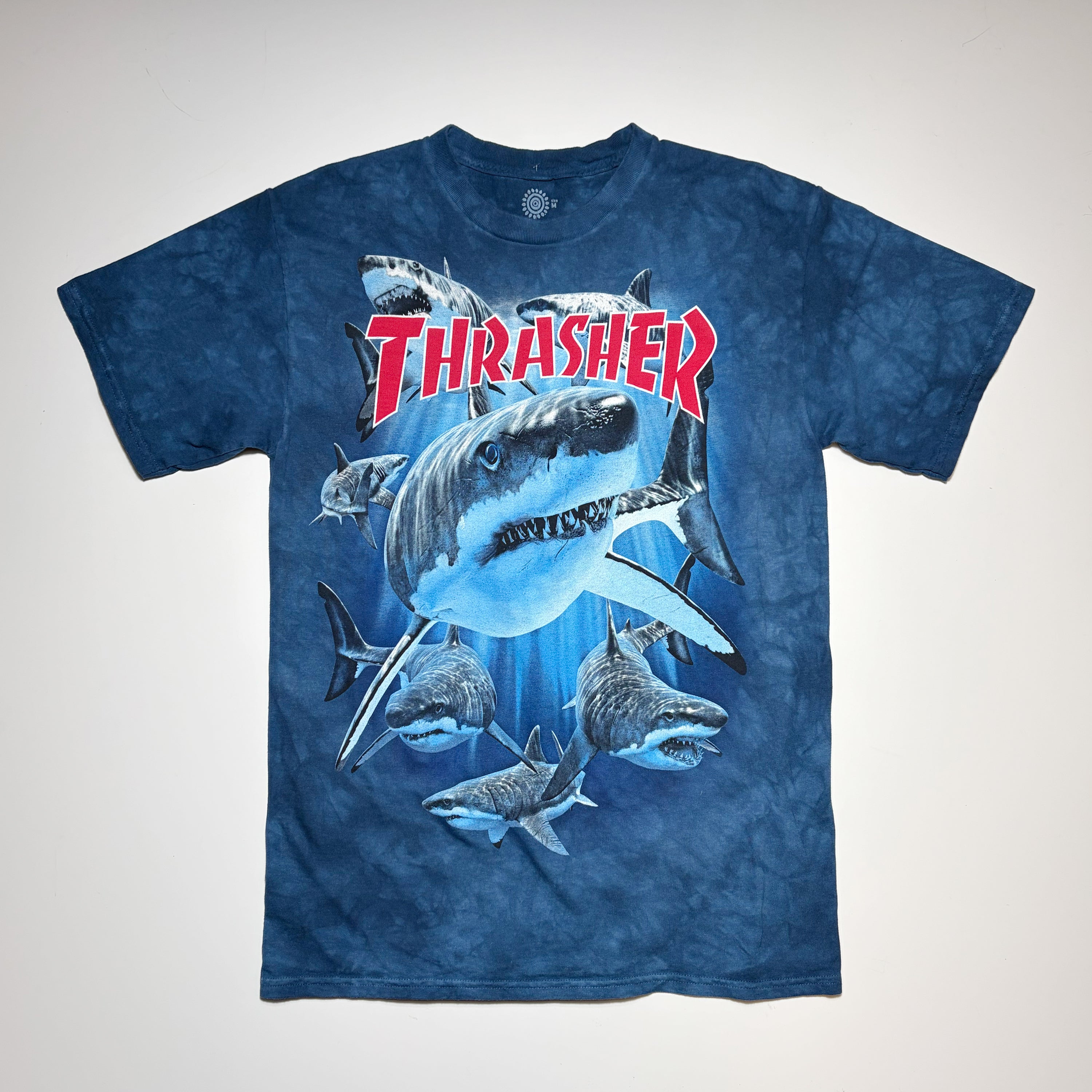 Full front image, Hand dyed blue Thrasher Magazine t-shirt with sharks printed on chest.