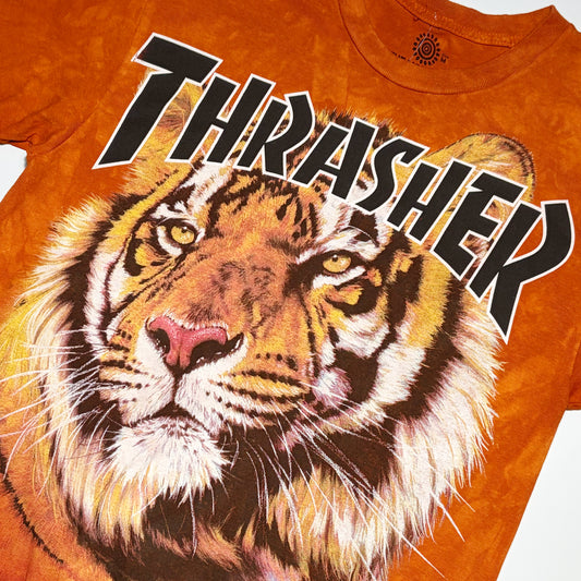 Close detail of Thrasher tiger art printed on chest.