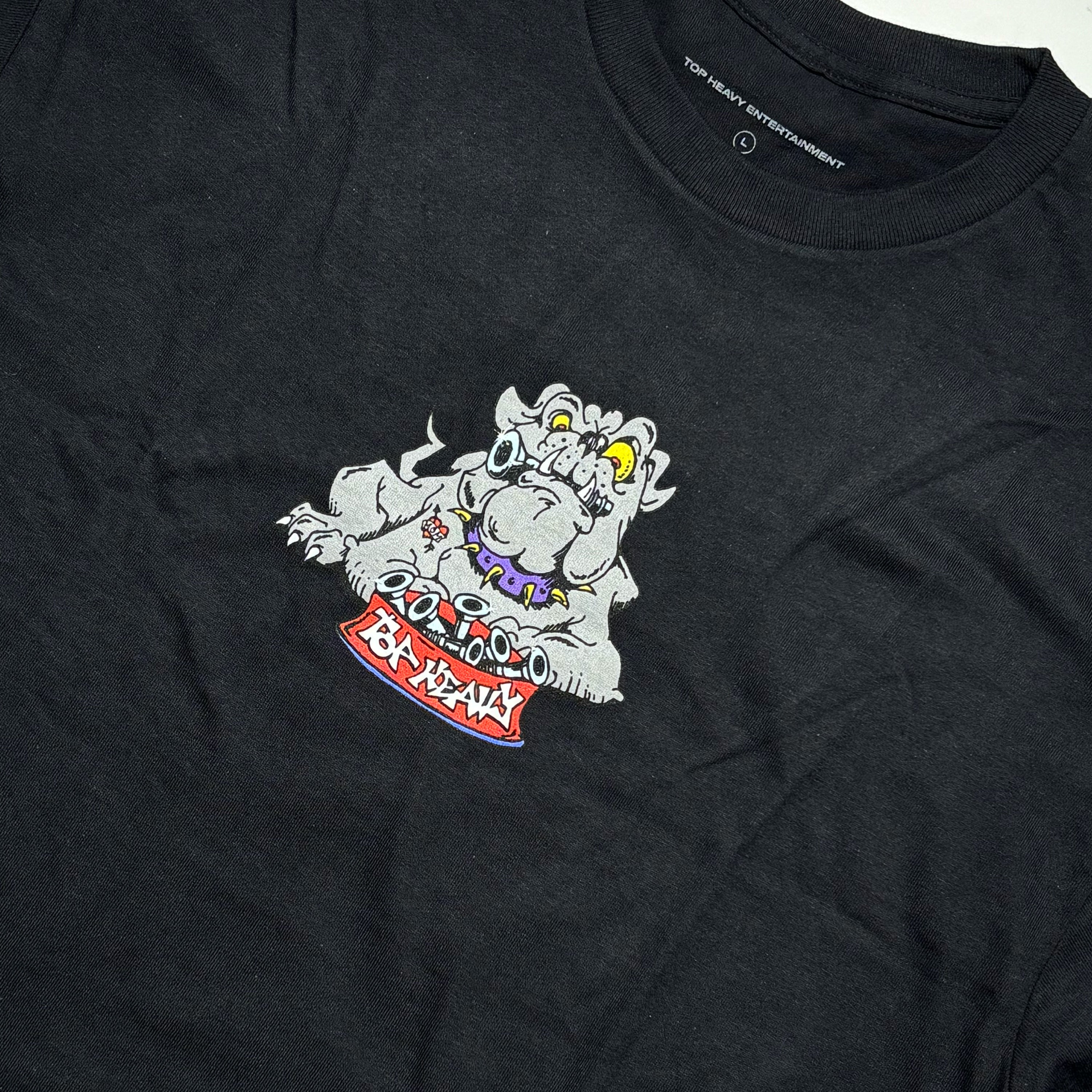 Close detail of dog art printed on chest.