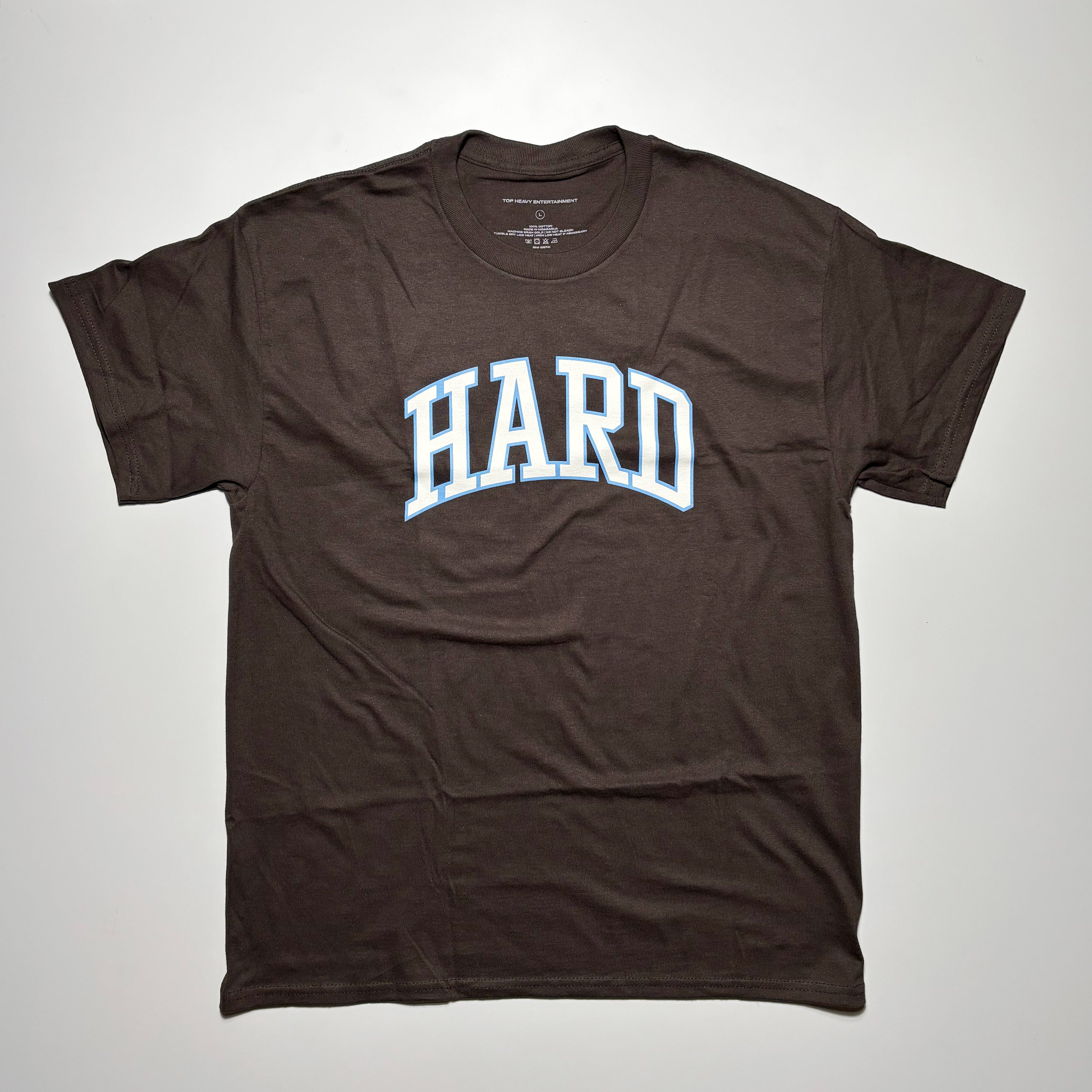 Front image of brown tee with art printed on chest.