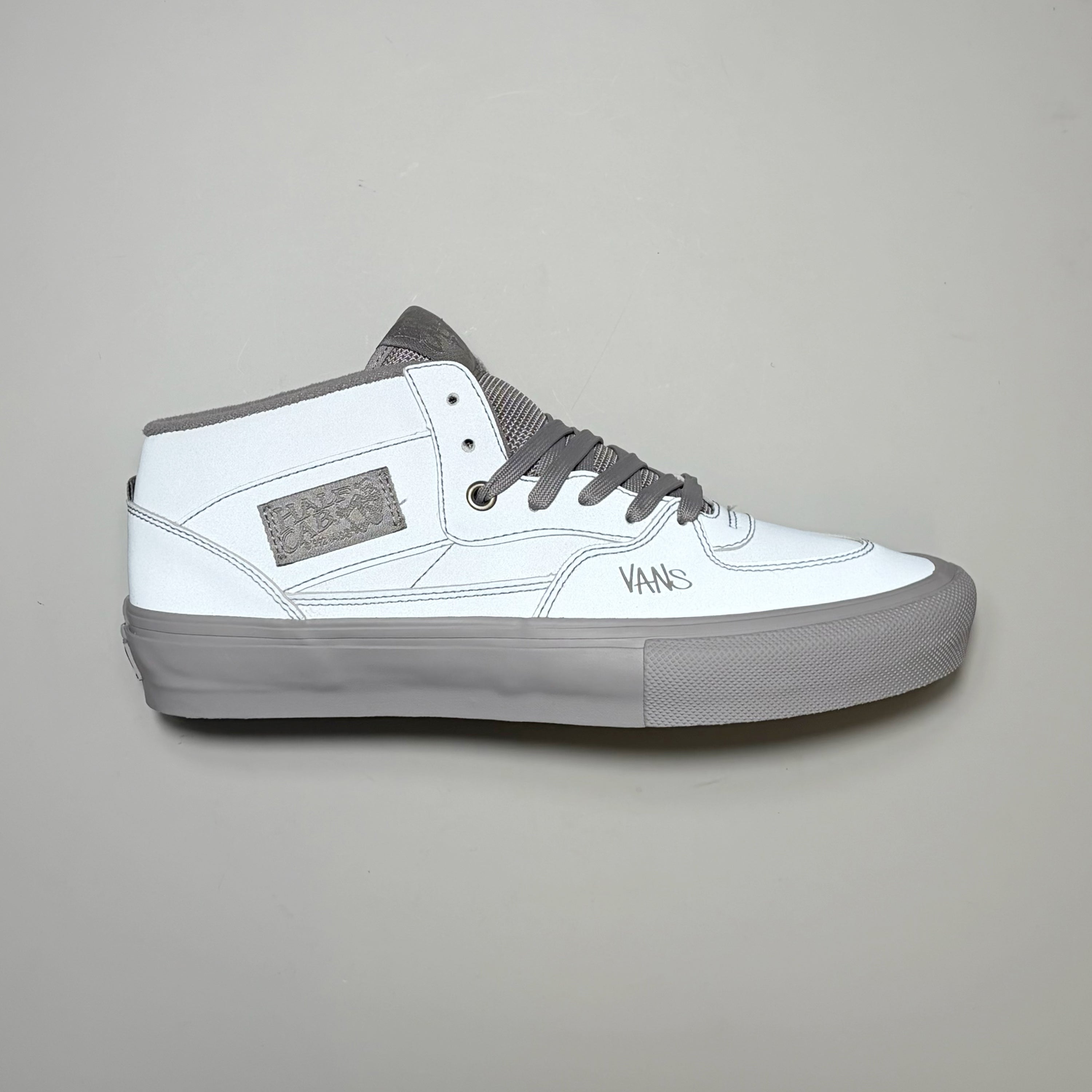 Right side image, Vans Skate Half-cab by Atiba Jefferson. Grey 3M reflective material with tonal grey outsole. 