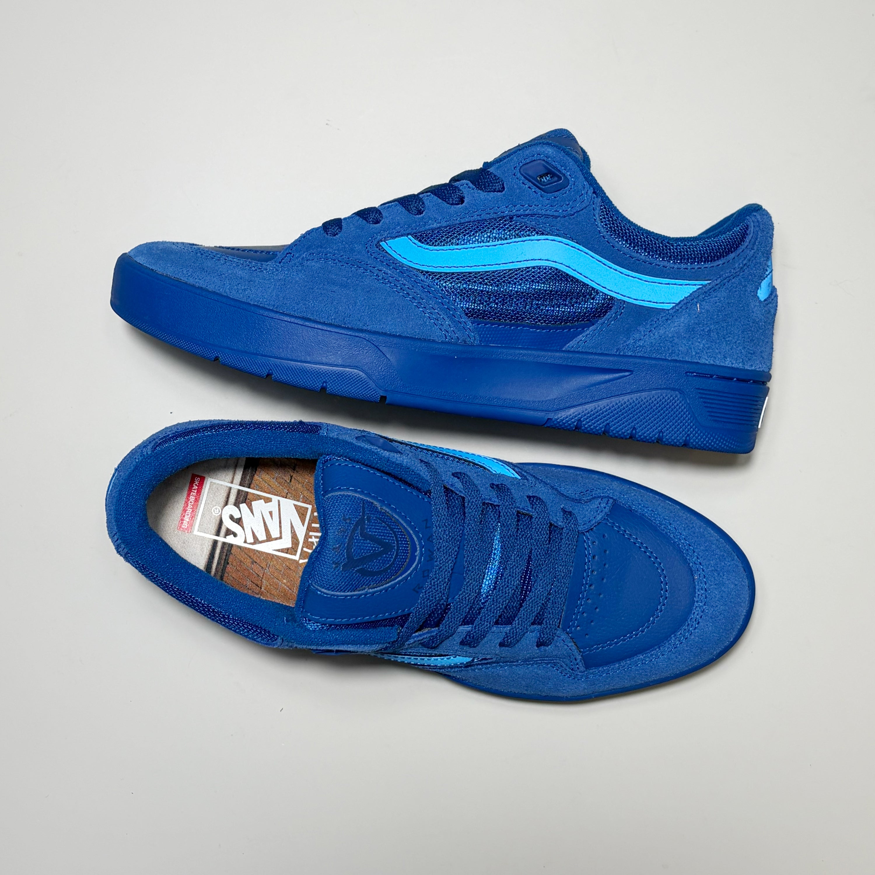 A pair of Vans Skate Rowan Z3 Atiba Jefferson sneakers in a monochromatic royal blue colorway, featuring suede and mesh panels, a thick sole, and a bright blue side stripe, displayed on a light gray background.