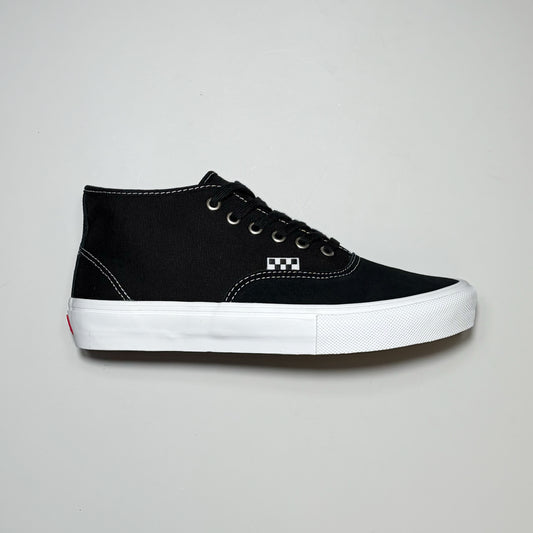 Right side image, Vans Skate Authentic Mid in black suede with white outsole. 