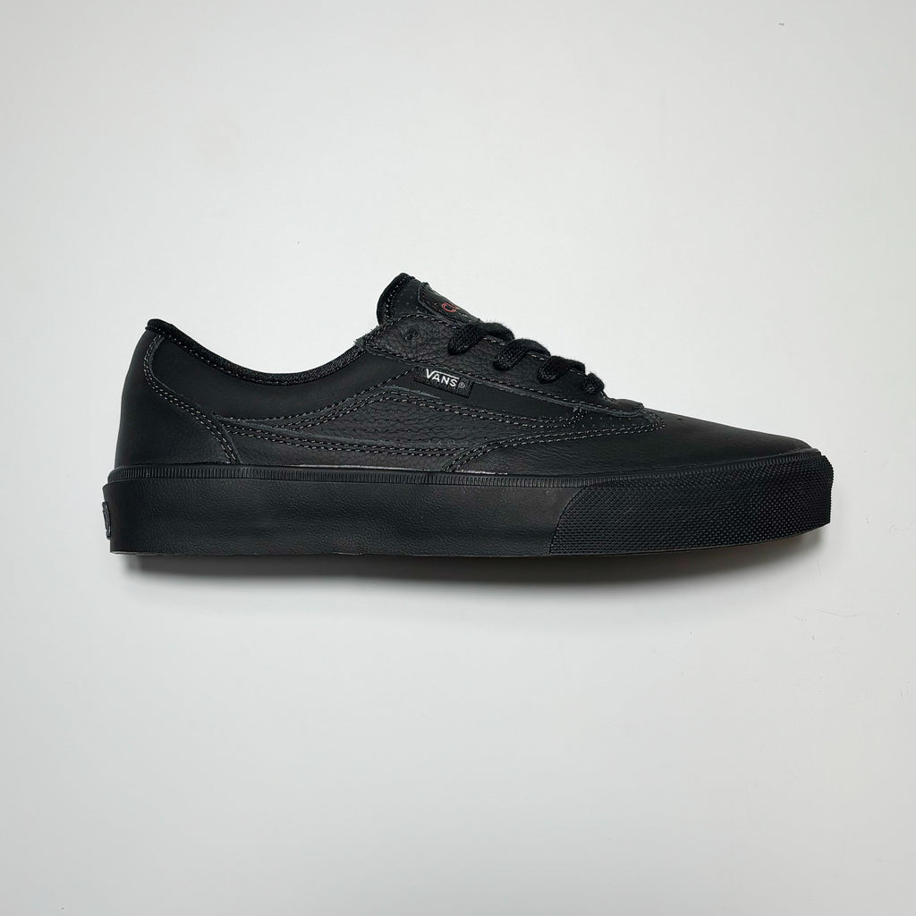 Side image of right shoe. 
Black leather with black outsole