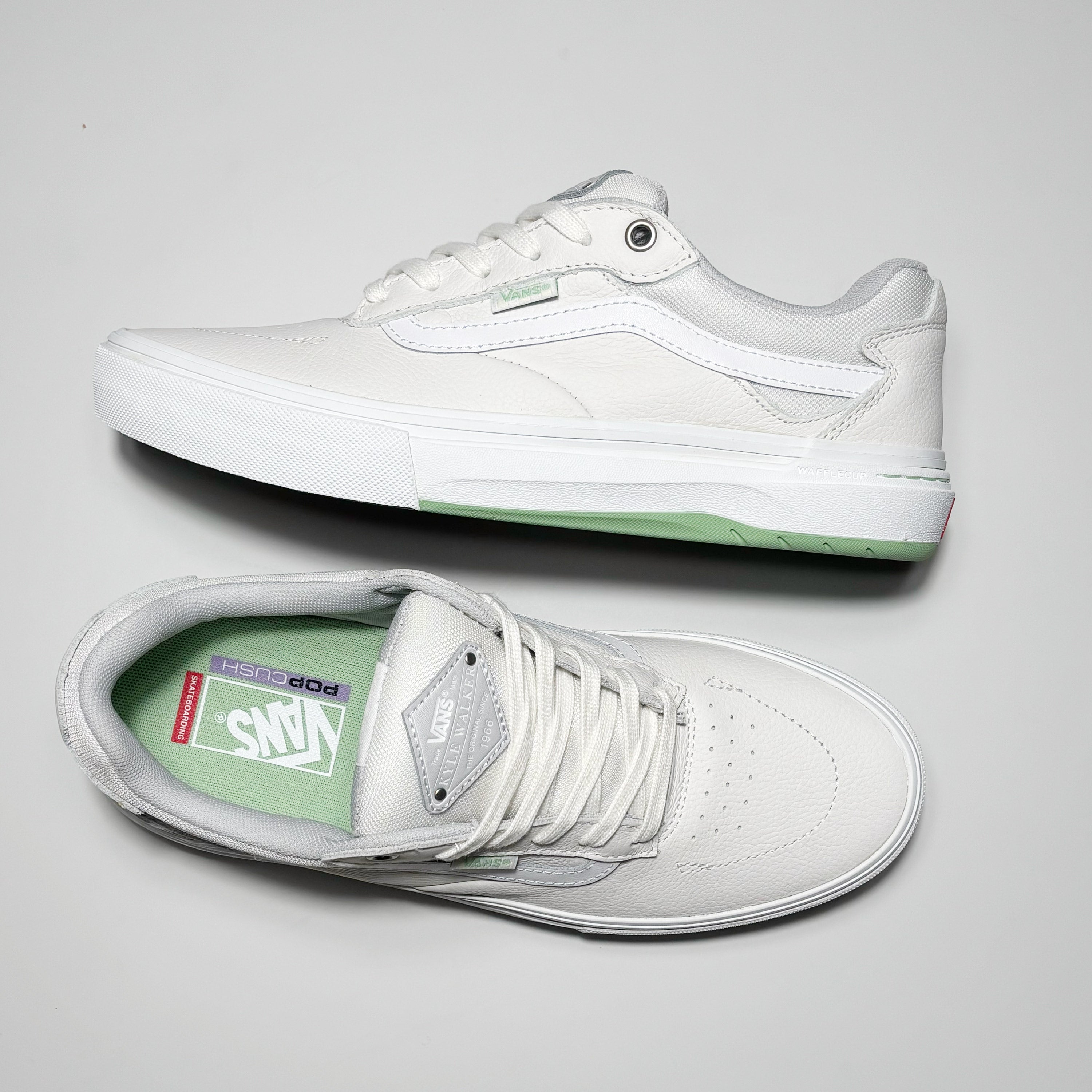 Toe down view with side profile. Vans Kyle Walker leather label on tongue.