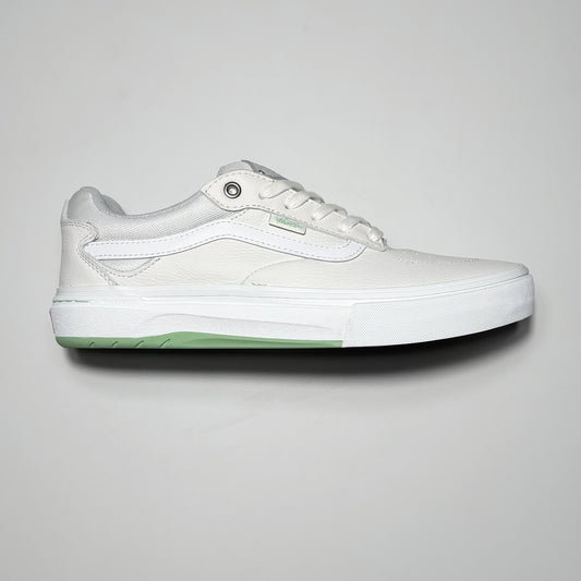 Side image of right shoe. White leather with white outsole.