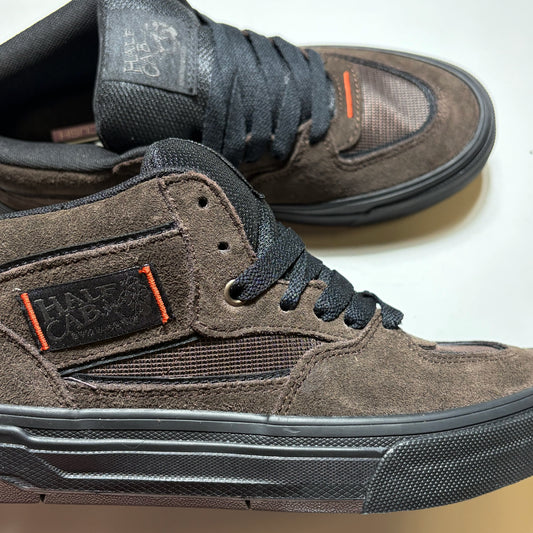 Close detail of Vans Skate Half Cab Wafflecup Dick Rizzo shoes. Brown suede, mesh with black outsoles. 