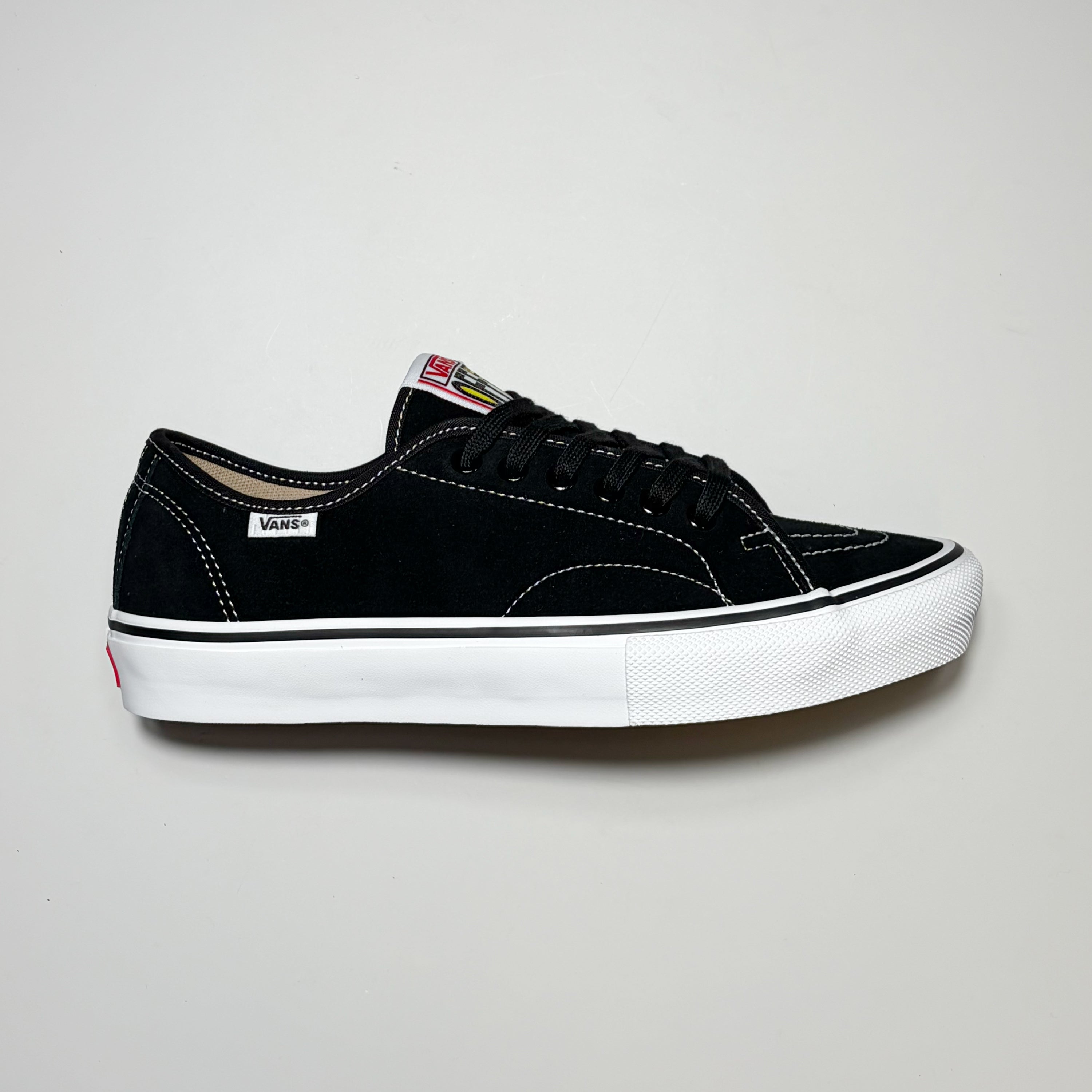 Right side image, Vans Skate AVE Classic shoe in black suede with white contrast stitching and outsole.