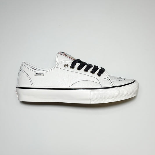 Right side image of shoe. Vans VCU AVE Classic in white leather with black contrast stitch and laces. Vans woven label on heel. VCU Limited Project Footwear