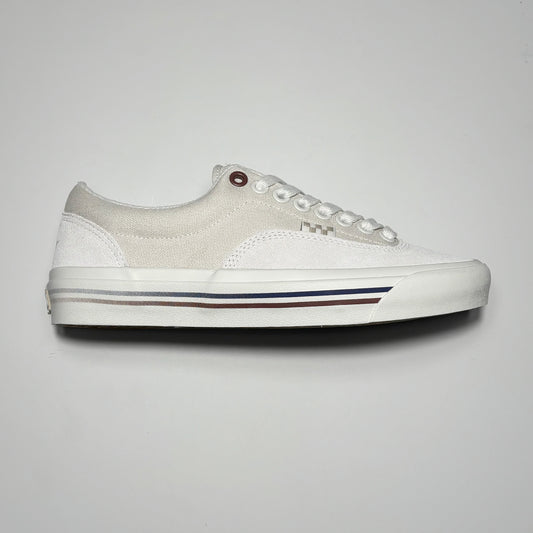 Side image of right shoe. Taupe suede with canvas mid-panel. Navy/Red stripe on outsole.