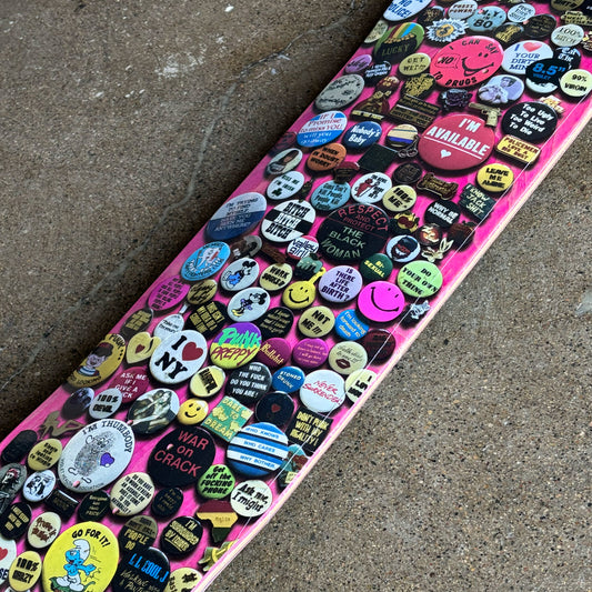 Close detail of pins artwork.