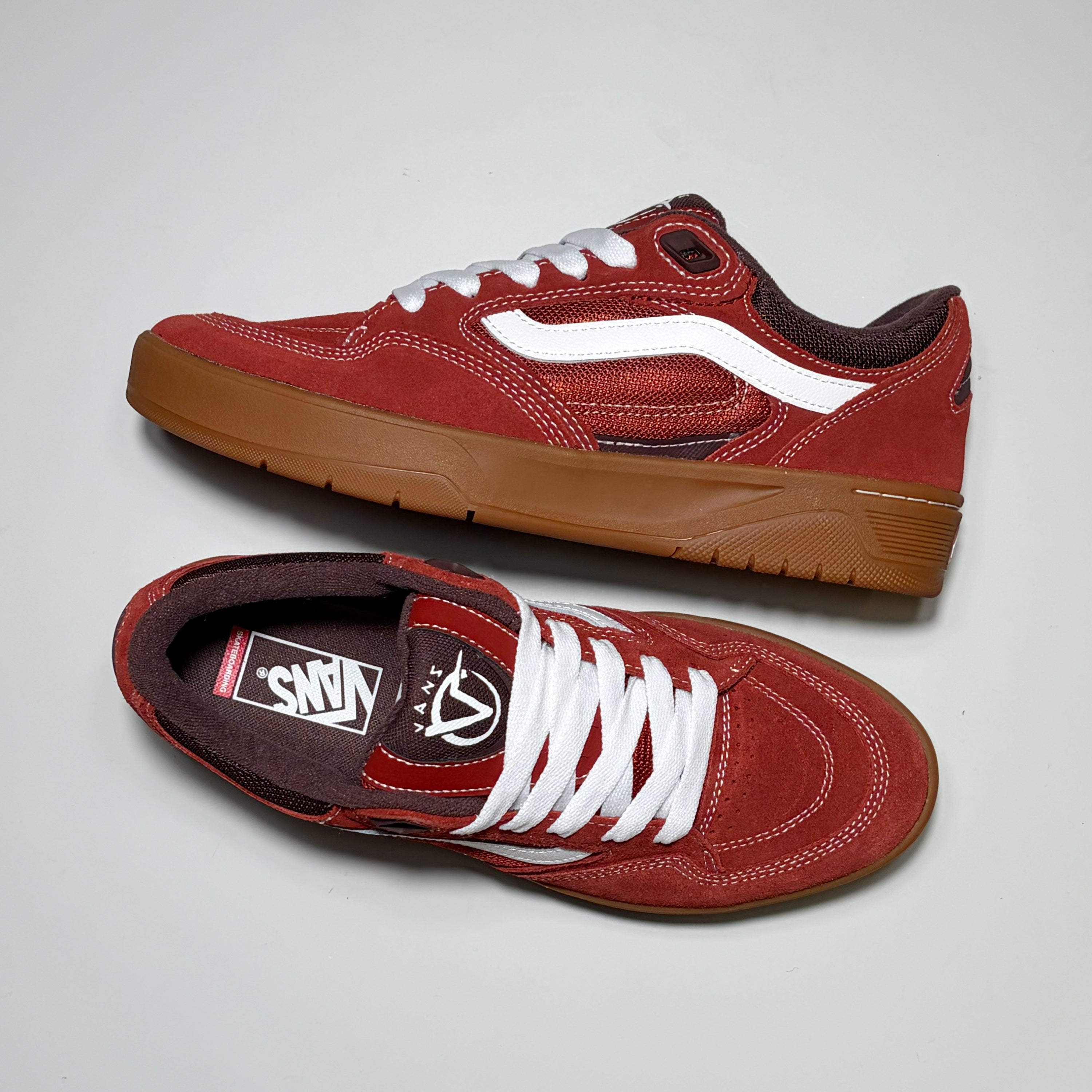 Pair of Vans Skate Rowan Z3 shoes. Bordeaux red with gum outsole on white background. 