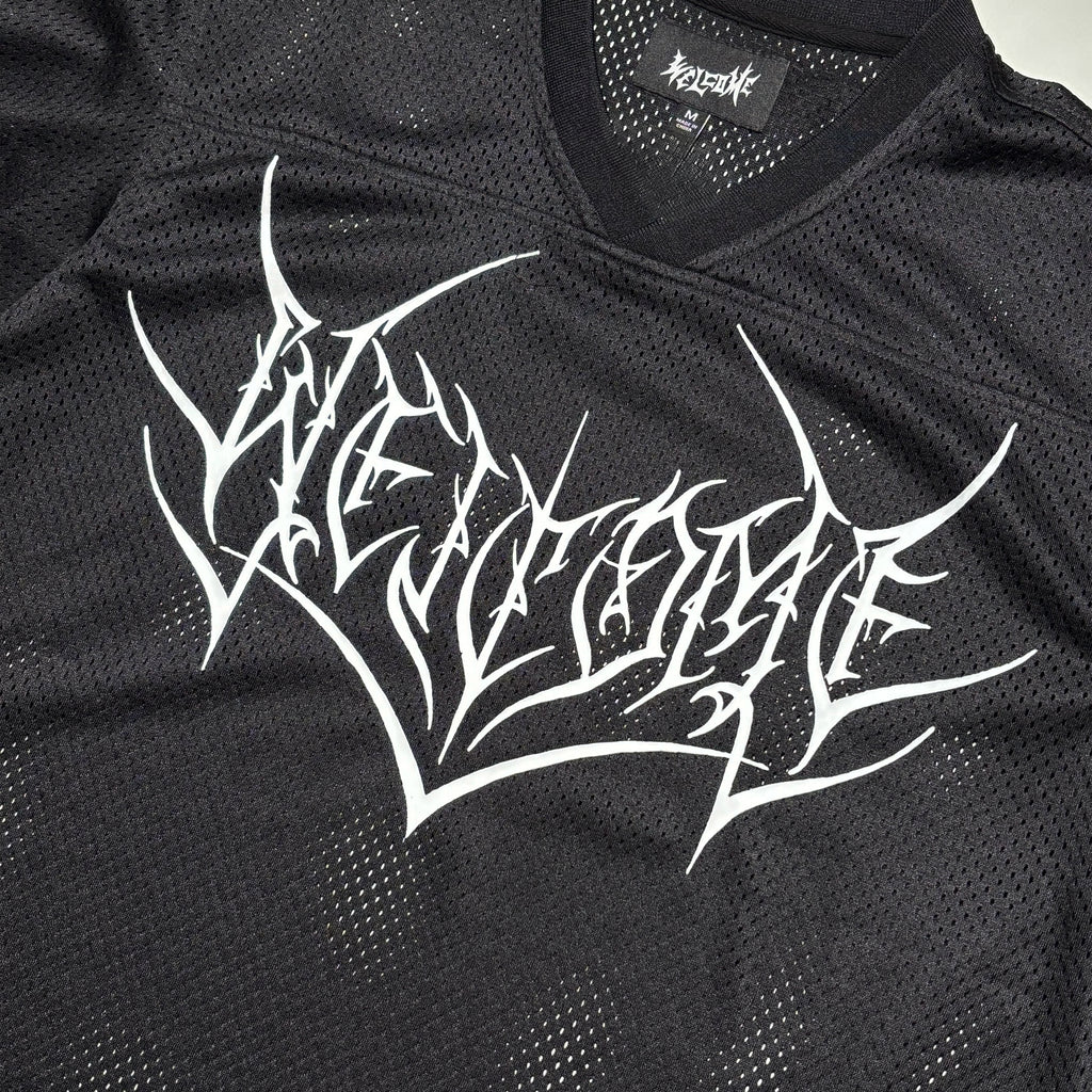 Close detail of art printed on chest