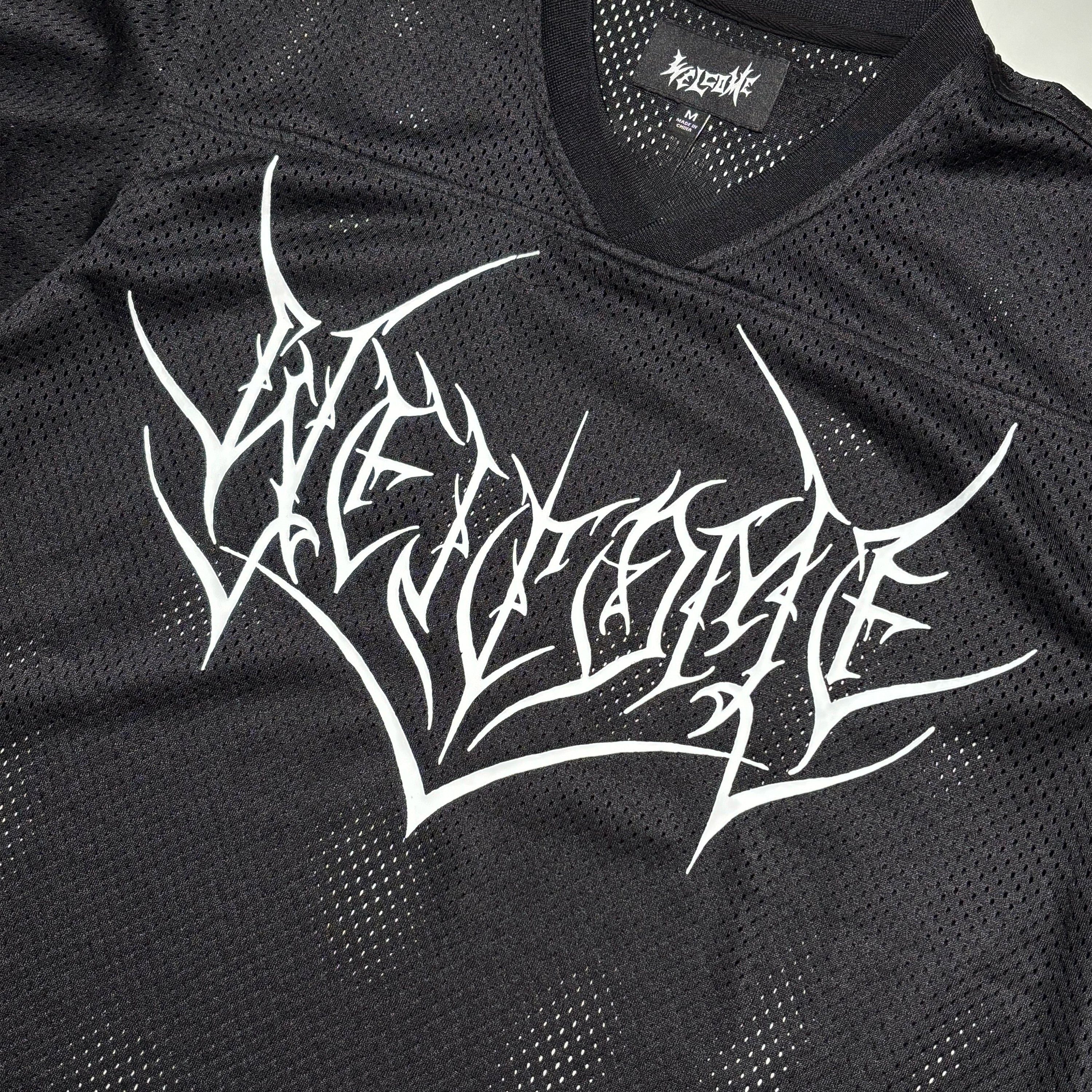 Close detail of art printed on chest