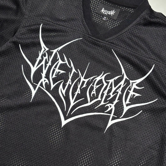 Close detail of art printed on chest
