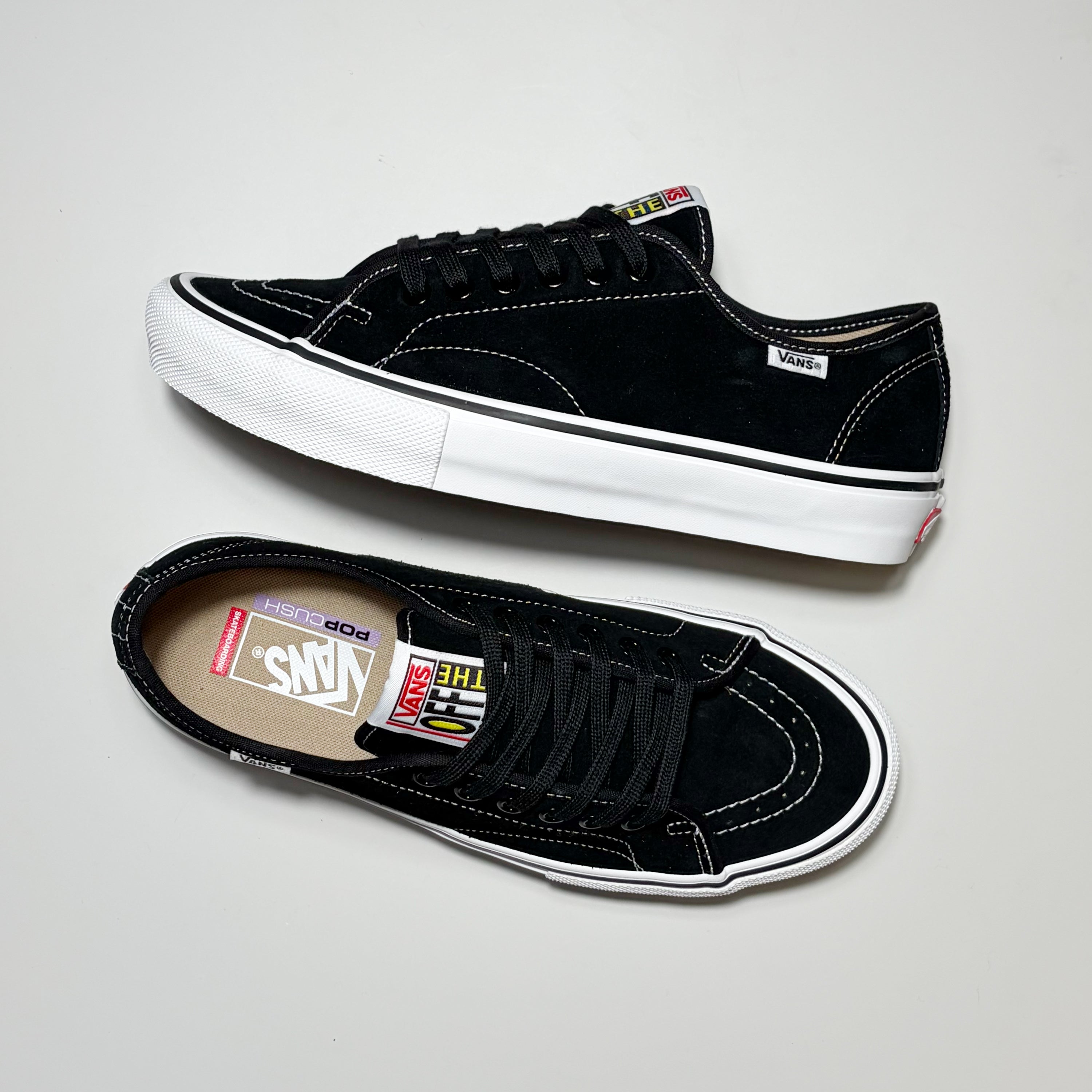 A pair of black suede Vans Skate AVE Classic sneakers with white rubber soles, shown from the side and top views on a light gray background.